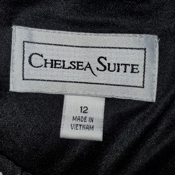 Black sleeveless dress with white polka dots and flower design Size 12 - Picture 7 of 7